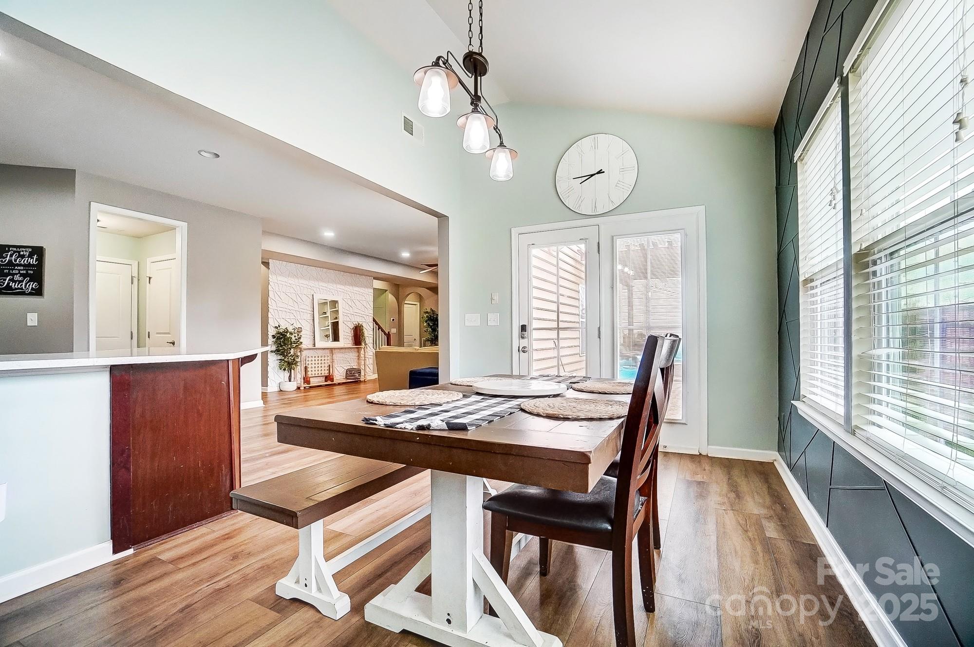 2065 Taney Way Indian Land, SC 29707 - Photo 19 of 43 a view of a dining room with furniture window and wooden floor