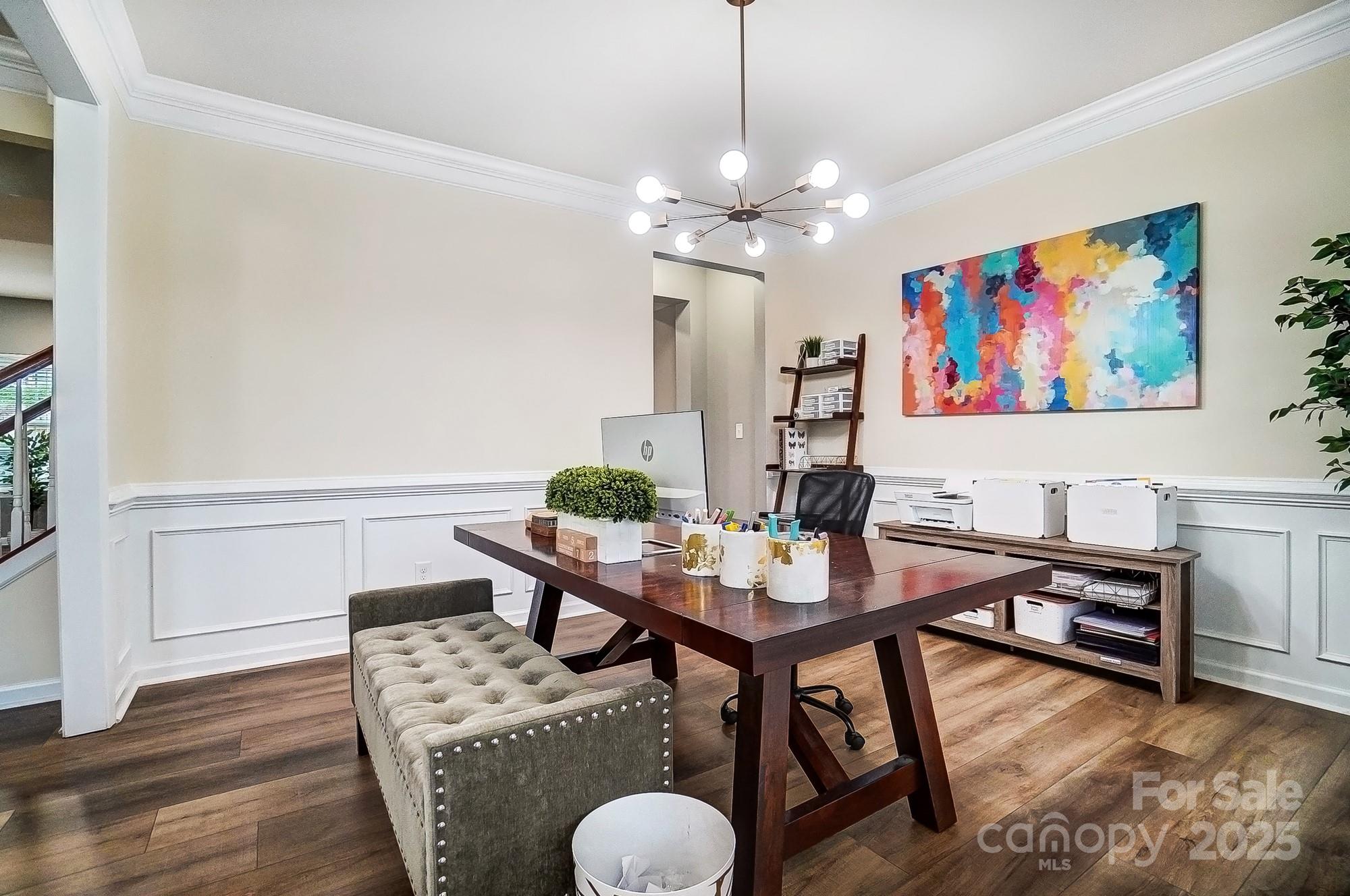 2065 Taney Way Indian Land, SC 29707 - Photo 21 of 43 a view of a livingroom and dining room with furniture wooden floor and a chandelier
