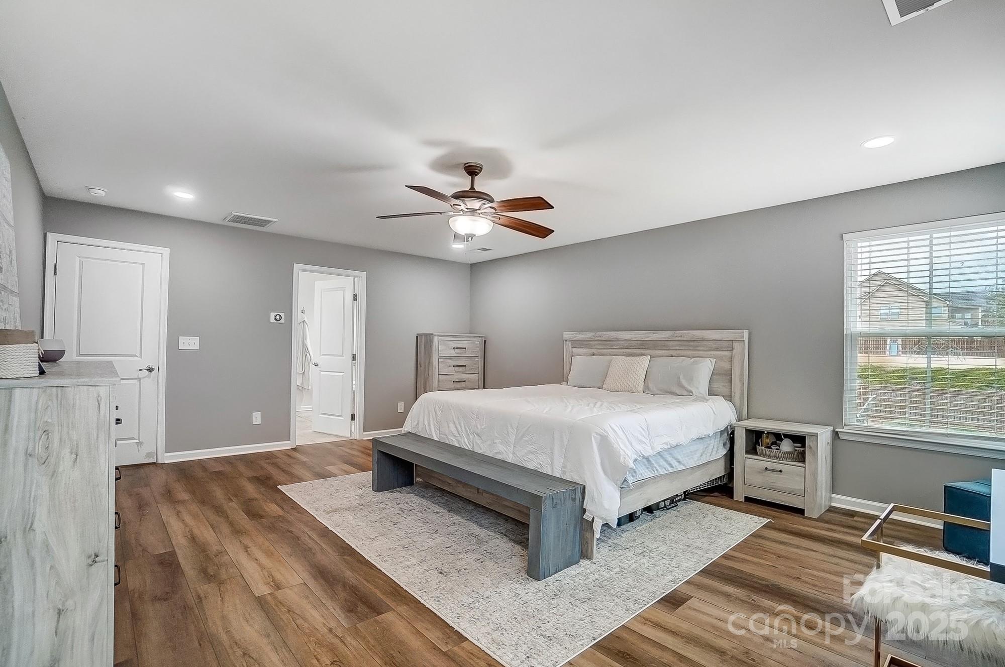 2065 Taney Way Indian Land, SC 29707 - Photo 26 of 43 a spacious bedroom with a bed and a window