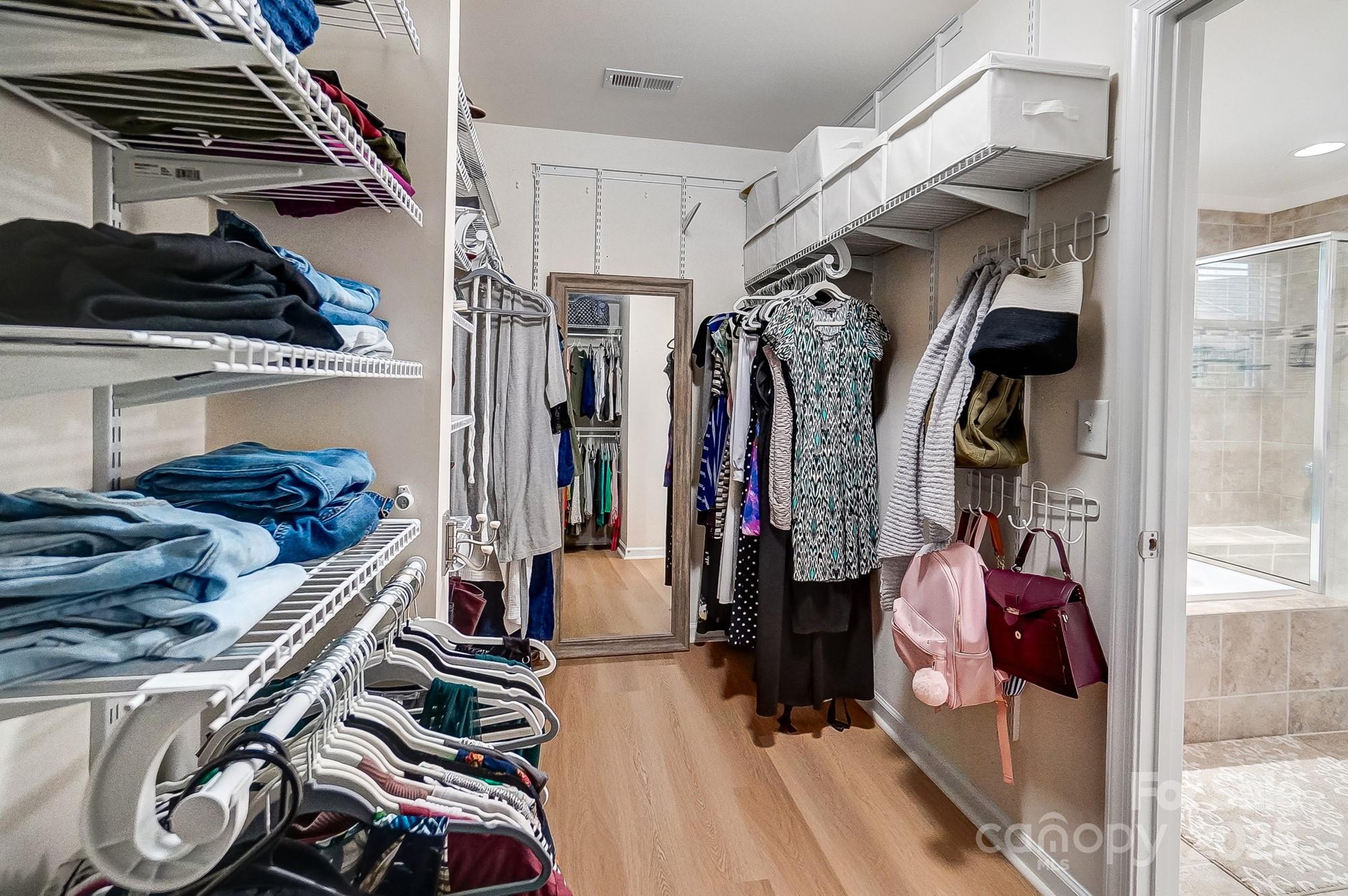 2065 Taney Way Indian Land, SC 29707 - Photo 30 of 43 a view of walk in closet with clothes and shoes