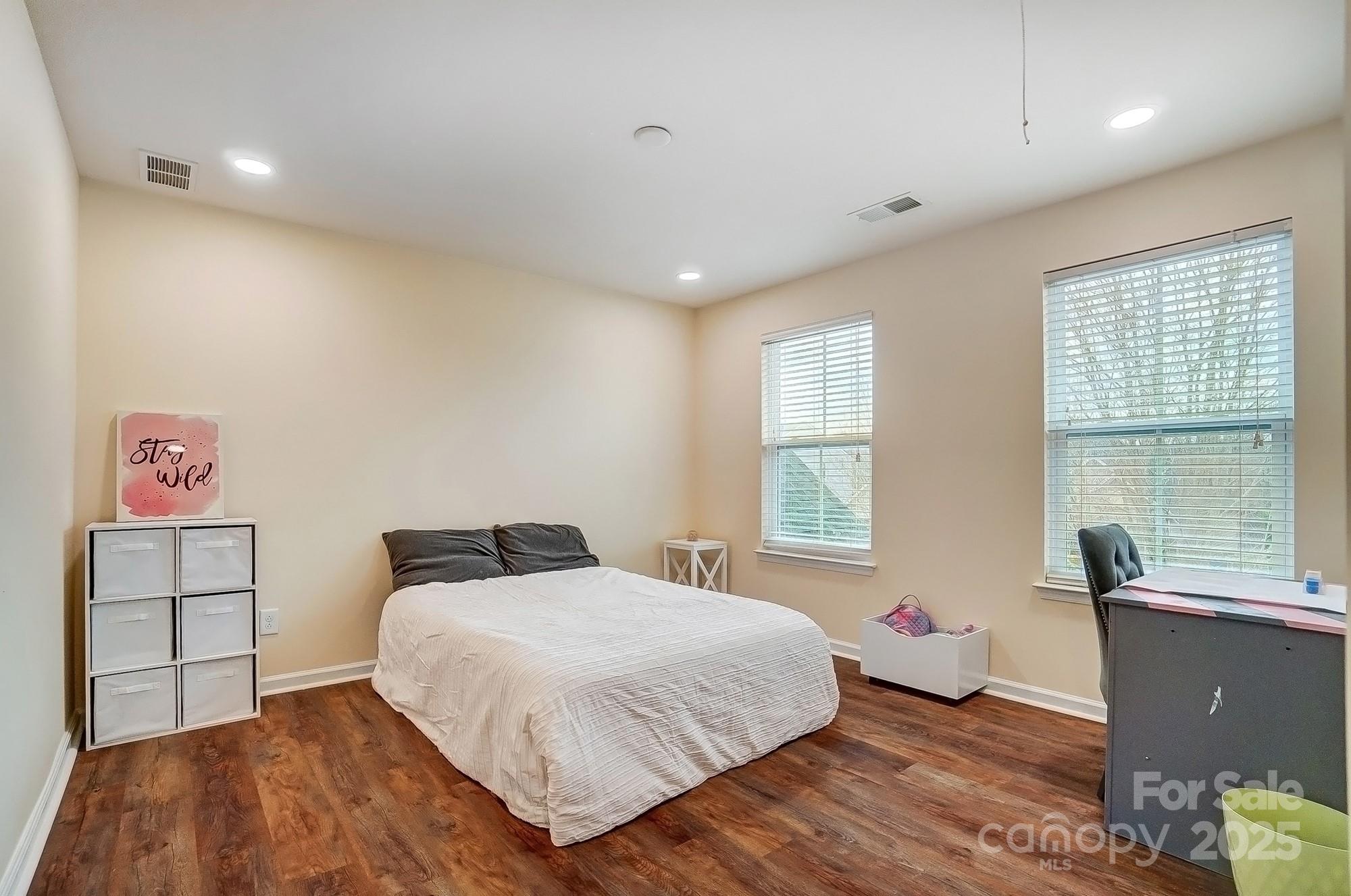 2065 Taney Way Indian Land, SC 29707 - Photo 37 of 43 a bedroom with a bed and wooden floor