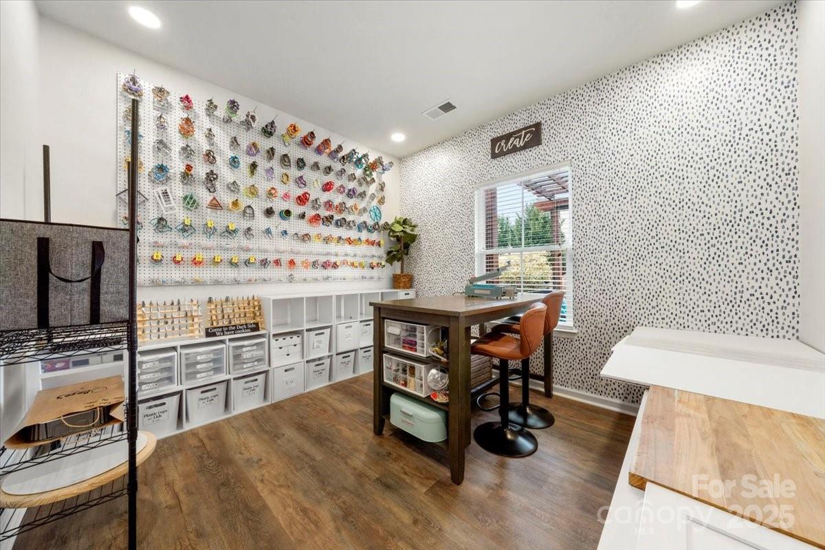 2065 Taney Way Indian Land, SC 29707 - Photo 6 of 43 a view of a workspace with furniture and wooden floor