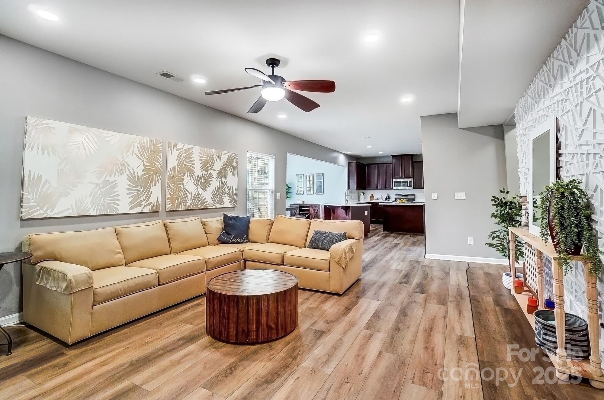 2065 Taney Way Indian Land, SC 29707 - Photo 10 of 43 a living room with furniture or wooden floor and a large window