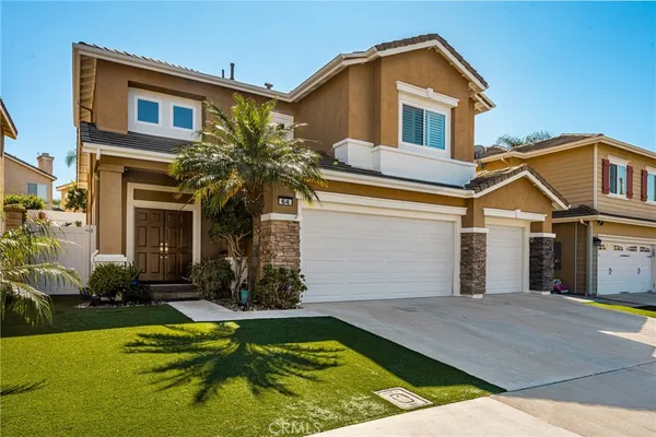 a front view of house with yard