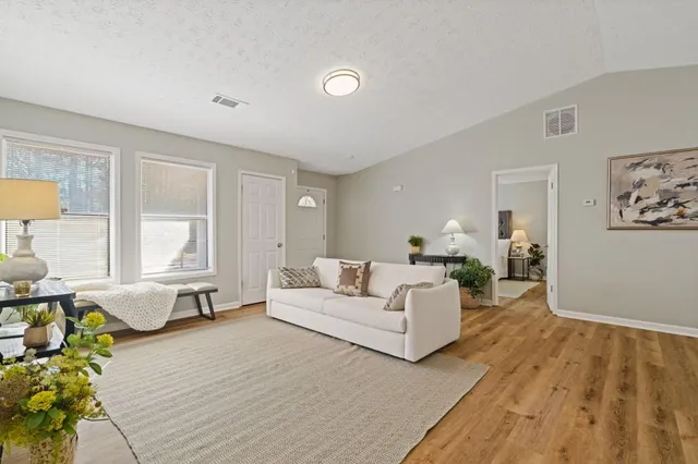 a living room with furniture and a couch