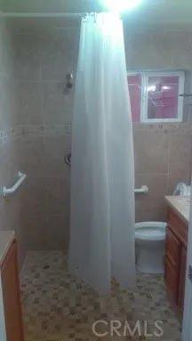 a bathroom with a sink and toilet