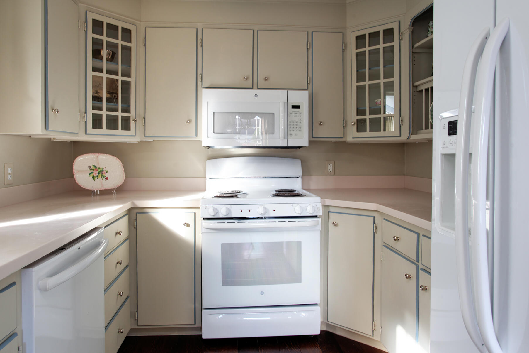 39 Tower Hill Road, Unit 16C Osterville, MA 02655 - Photo 16 of 42 a kitchen with cabinets appliances and a window