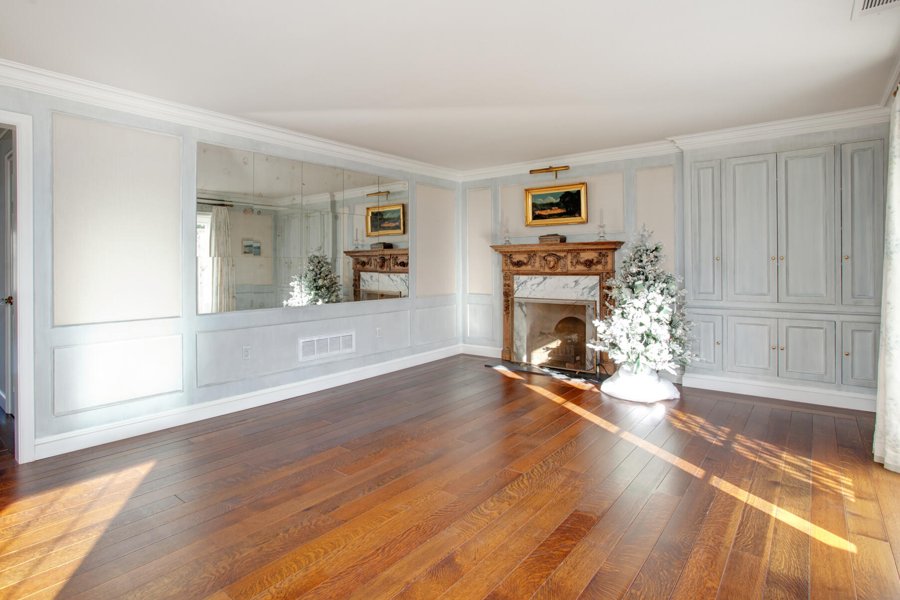 39 Tower Hill Road, Unit 16C Osterville, MA 02655 - Photo 2 of 42 a view of a livingroom with wooden floor a fireplace and window