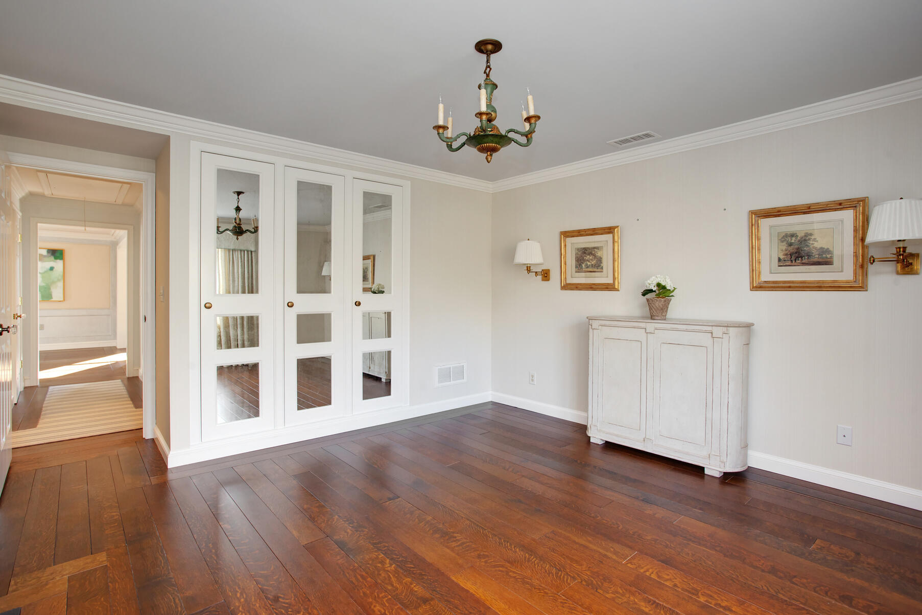 39 Tower Hill Road, Unit 16C Osterville, MA 02655 - Photo 21 of 42 a view of an empty room with wooden floor and a window