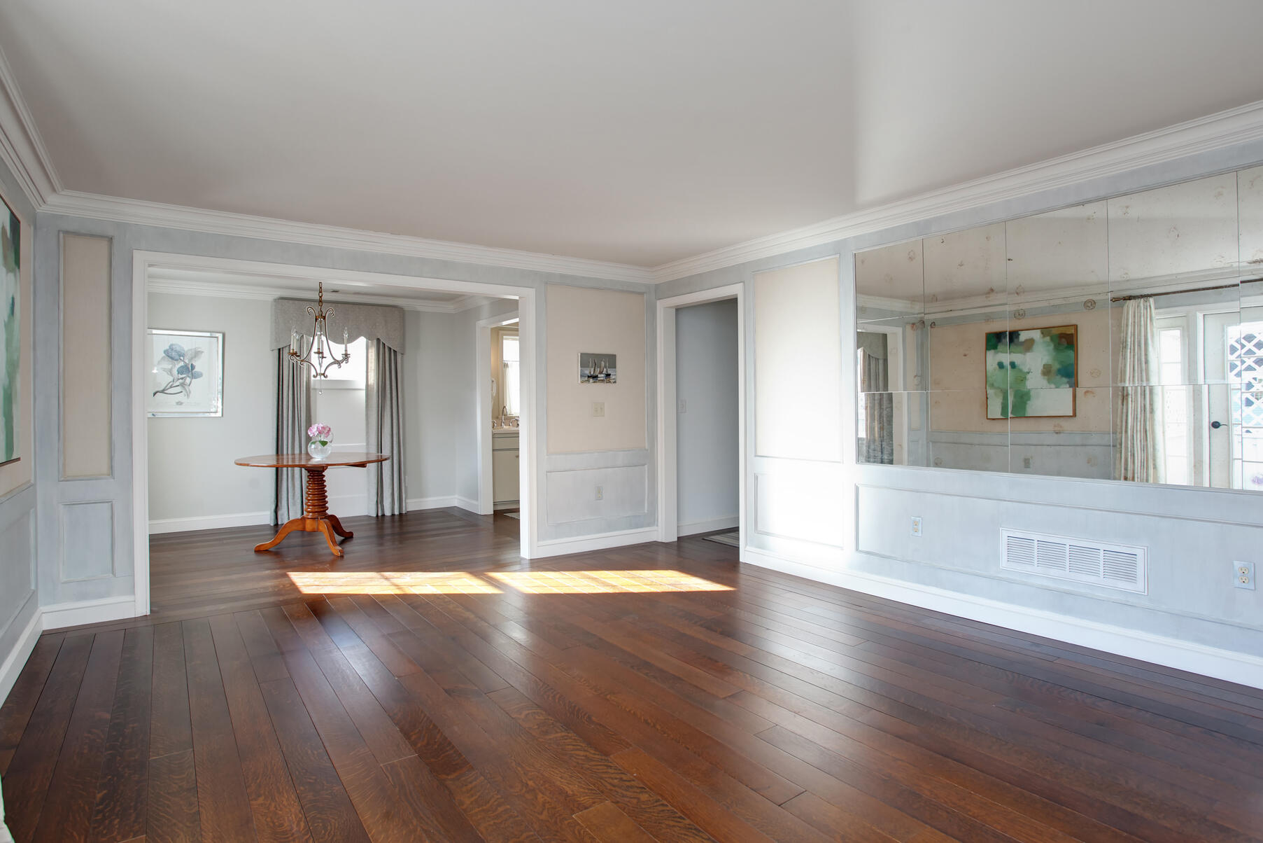 39 Tower Hill Road, Unit 16C Osterville, MA 02655 - Photo 9 of 42 an empty room with wooden floor and windows