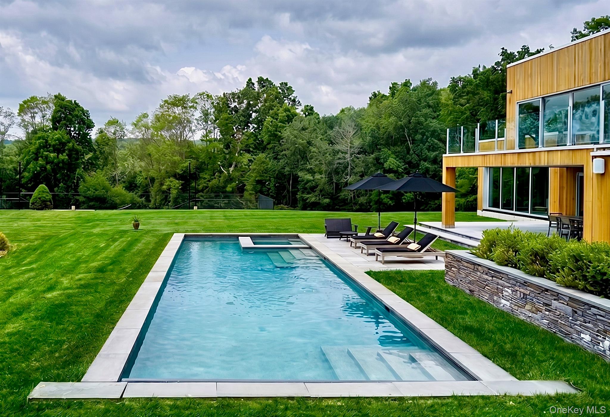 33 Ford Road Chatham, NY 12136 - Photo 13 of 33 a view of backyard with swimming pool and green space