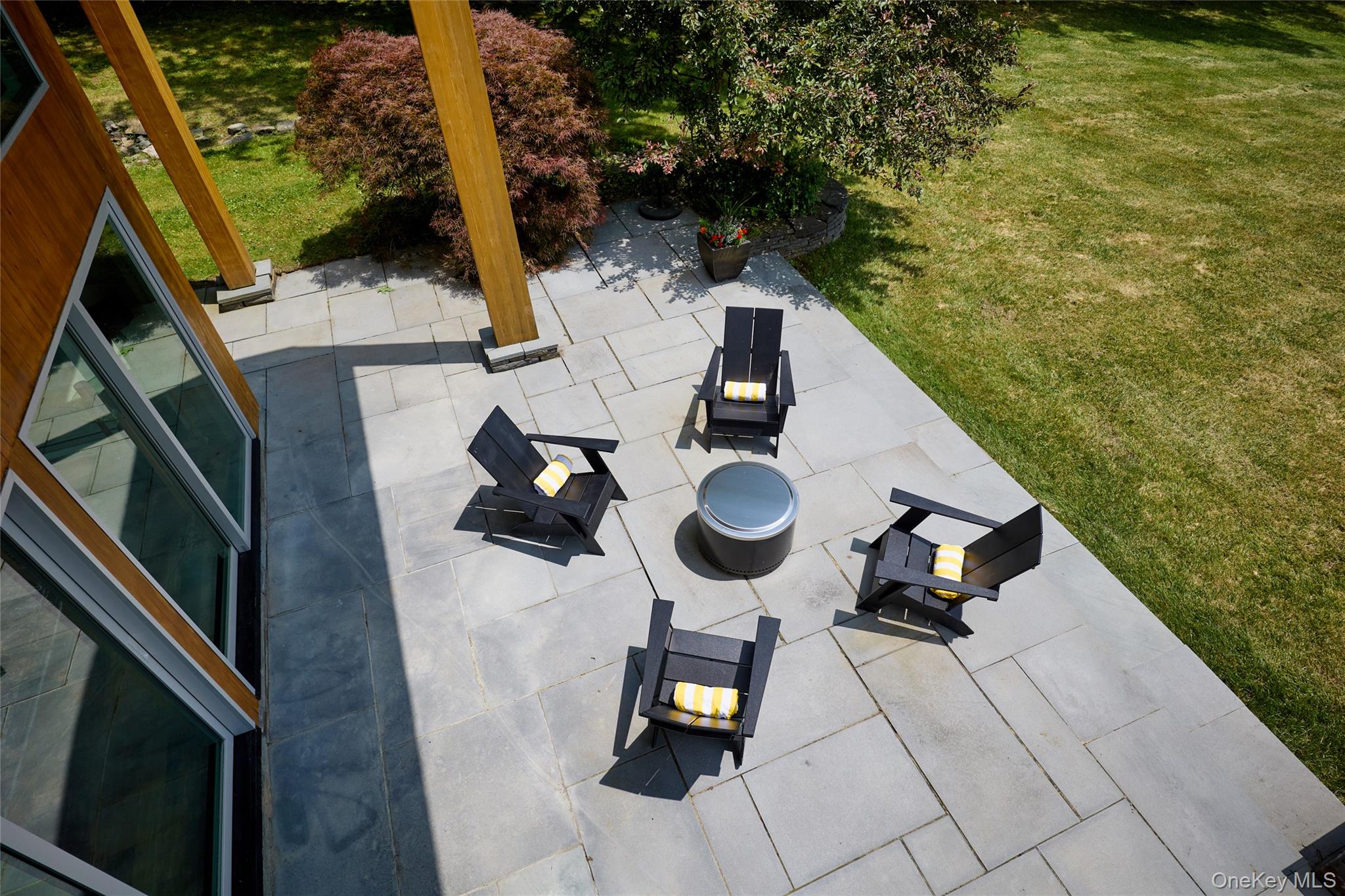 33 Ford Road Chatham, NY 12136 - Photo 27 of 33 a backyard of a house with seating space