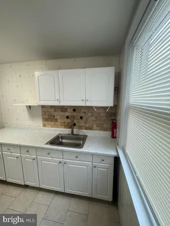 a bathroom with a sink and a tub