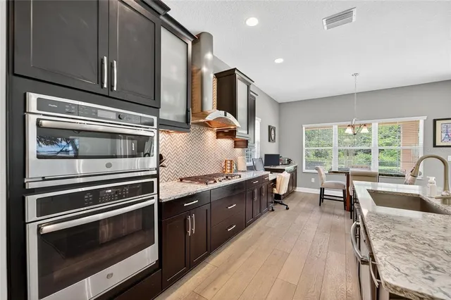 a bedroom with a bed and a television