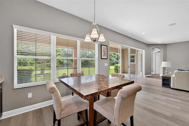 a bathroom with a granite countertop sink mirror and a