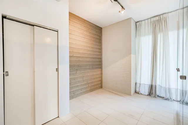 an empty room with windows