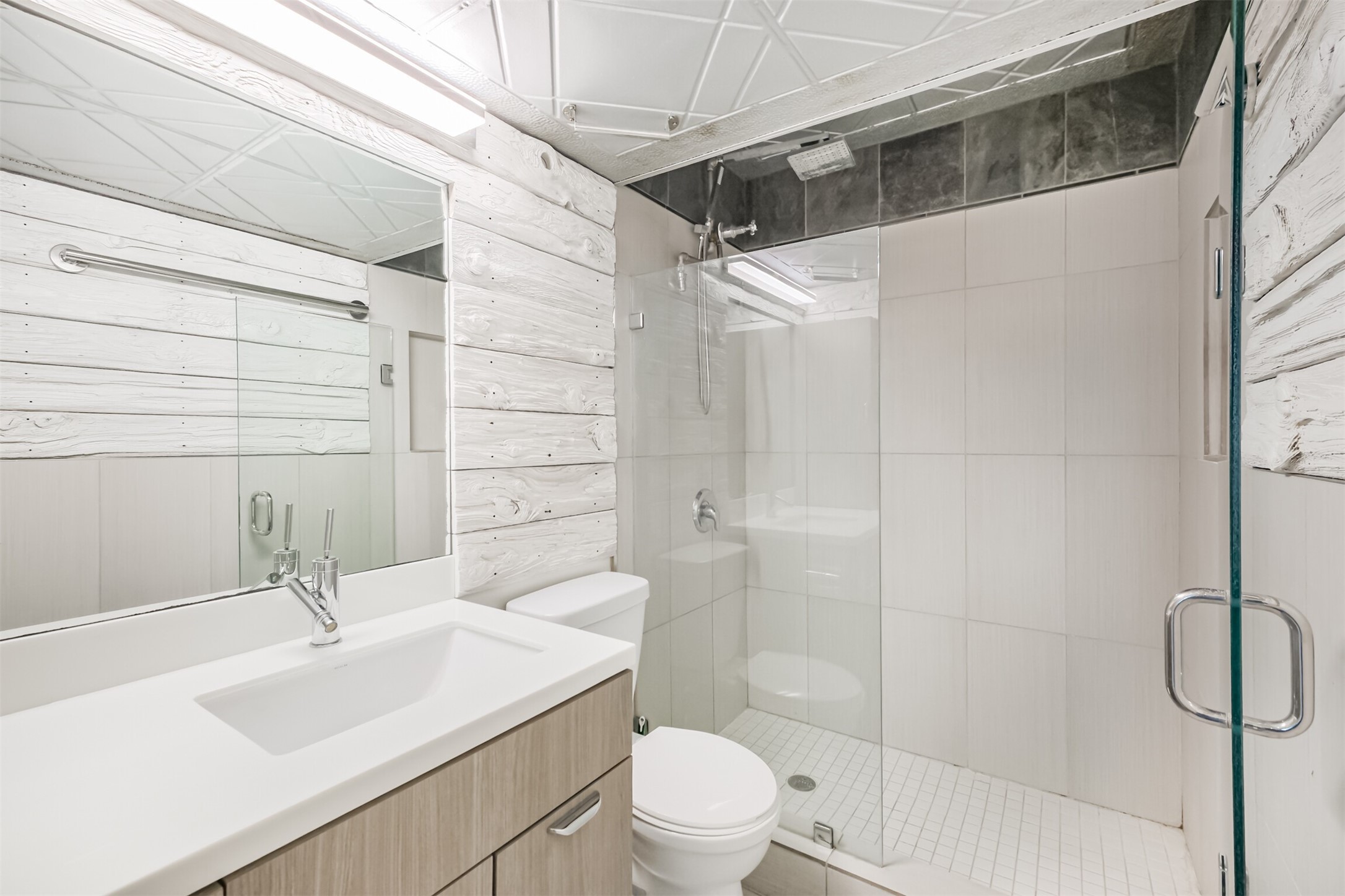 3600 Montrose Boulevard, Unit 104 Houston, TX 77006 - Photo 24 of 42 a bathroom with a sink toilet and shower