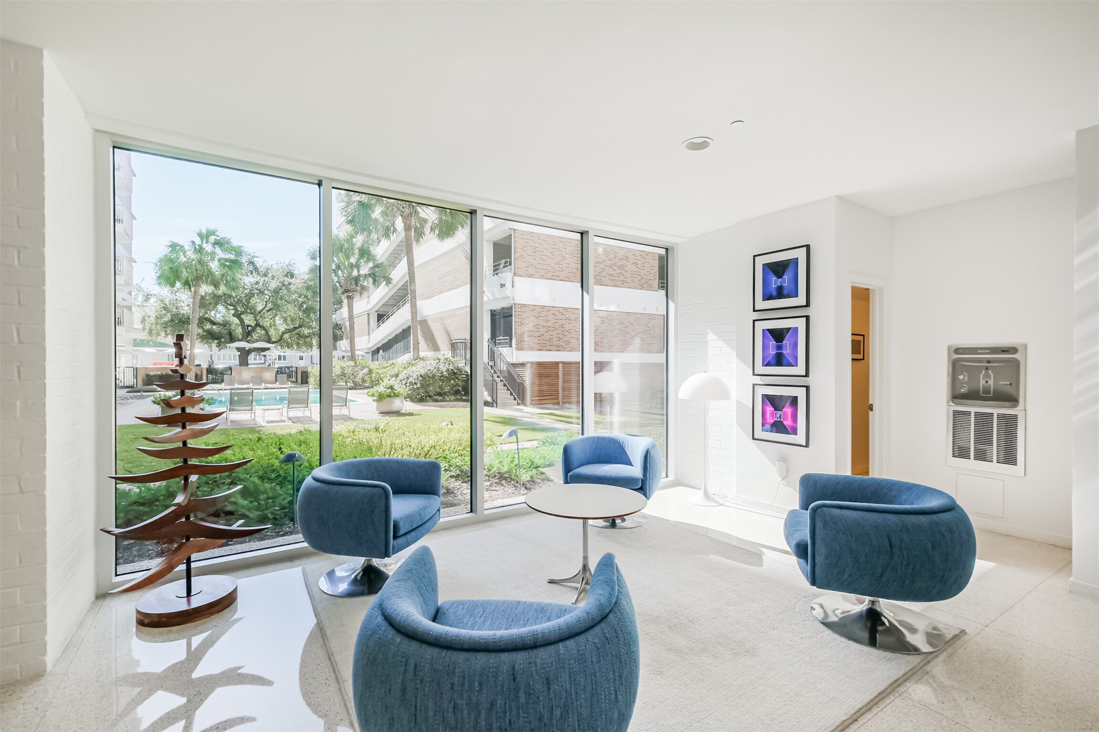 3600 Montrose Boulevard, Unit 104 Houston, TX 77006 - Photo 26 of 42 a living room with furniture and a large window