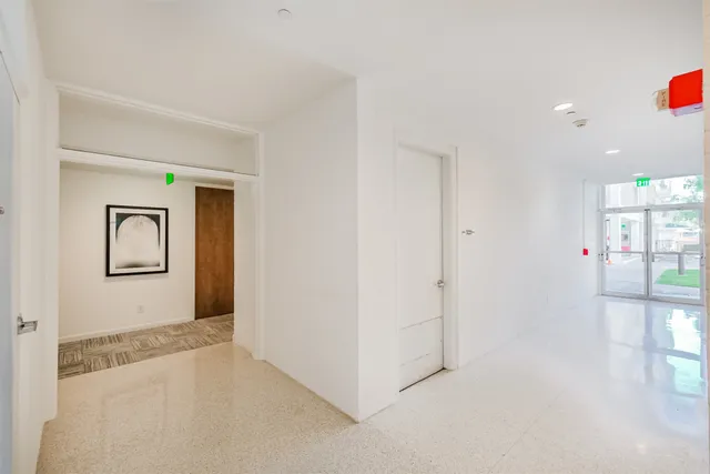 a view of a hallway with entryway