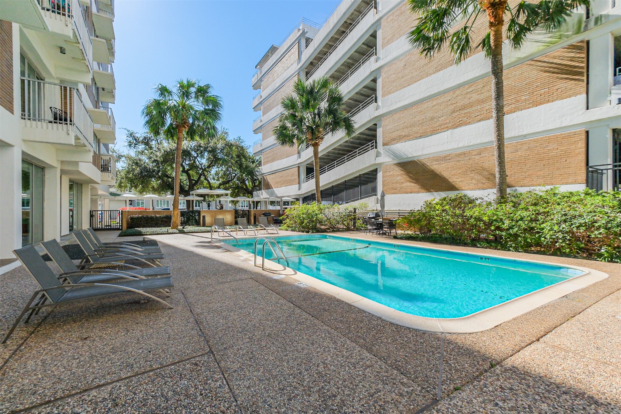 3600 Montrose Boulevard, Unit 104 Houston, TX 77006 - Photo 36 of 42 a view of outdoor space yard swimming pool and seating