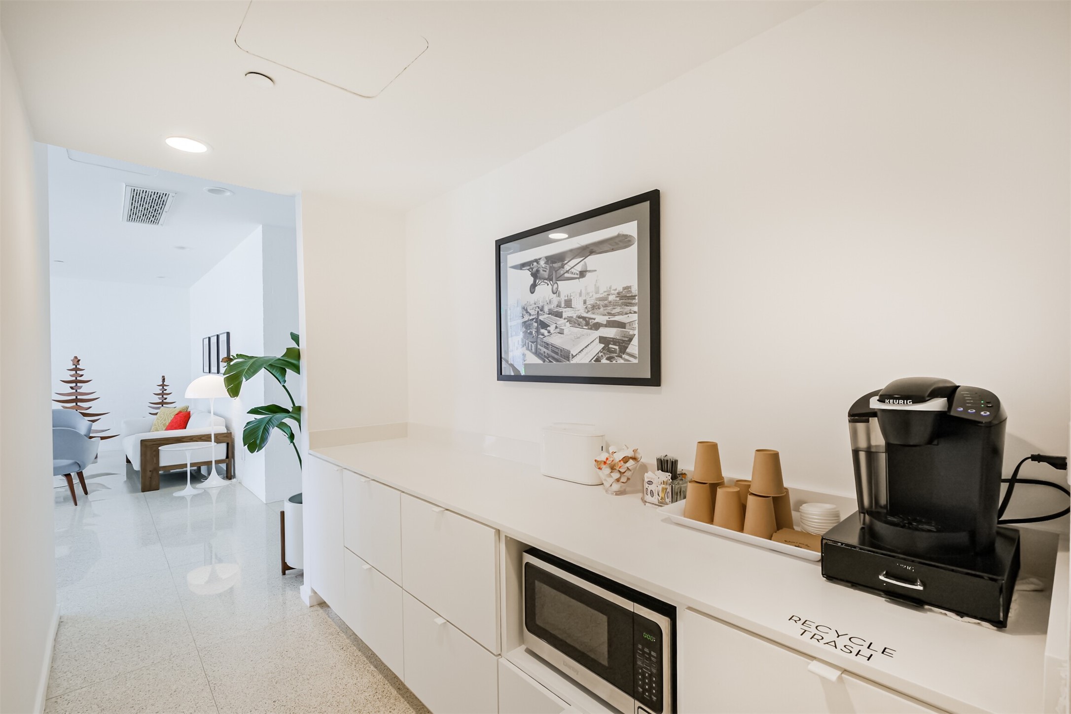 3600 Montrose Boulevard, Unit 104 Houston, TX 77006 - Photo 39 of 42 a living room with furniture and a flat screen tv