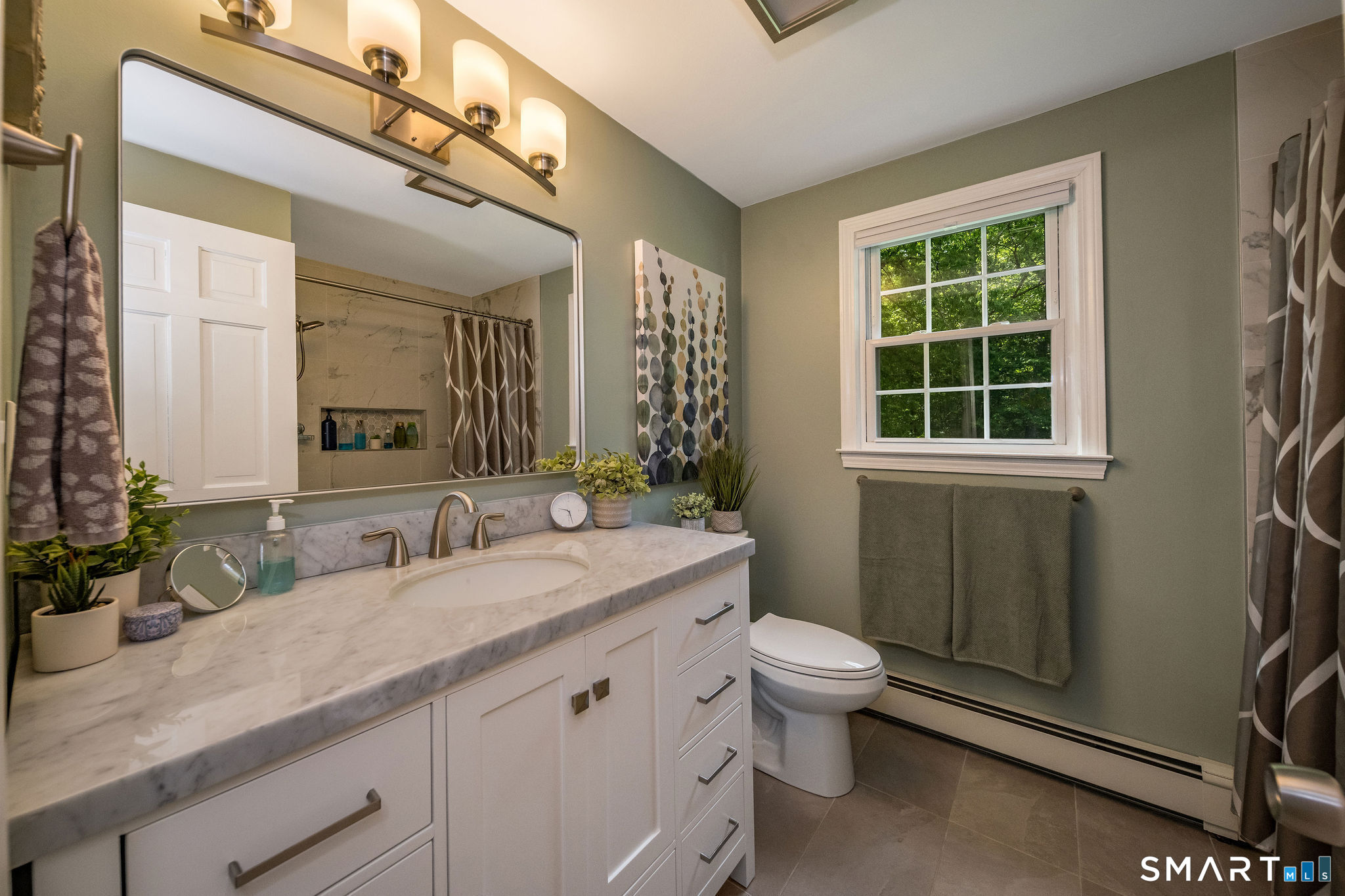 60 Bradley Corners Road Madison, CT 06443 - Photo 21 of 33 a bathroom with a granite countertop sink toilet and shower