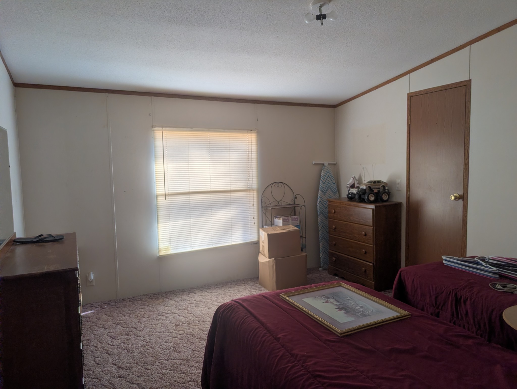 228 Shasteen Ridge Road Lynchburg, TN 37352 - Photo 12 of 12 a bedroom with a bed and wooden floor
