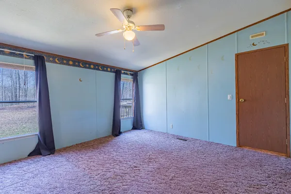 a view of a room with a fan