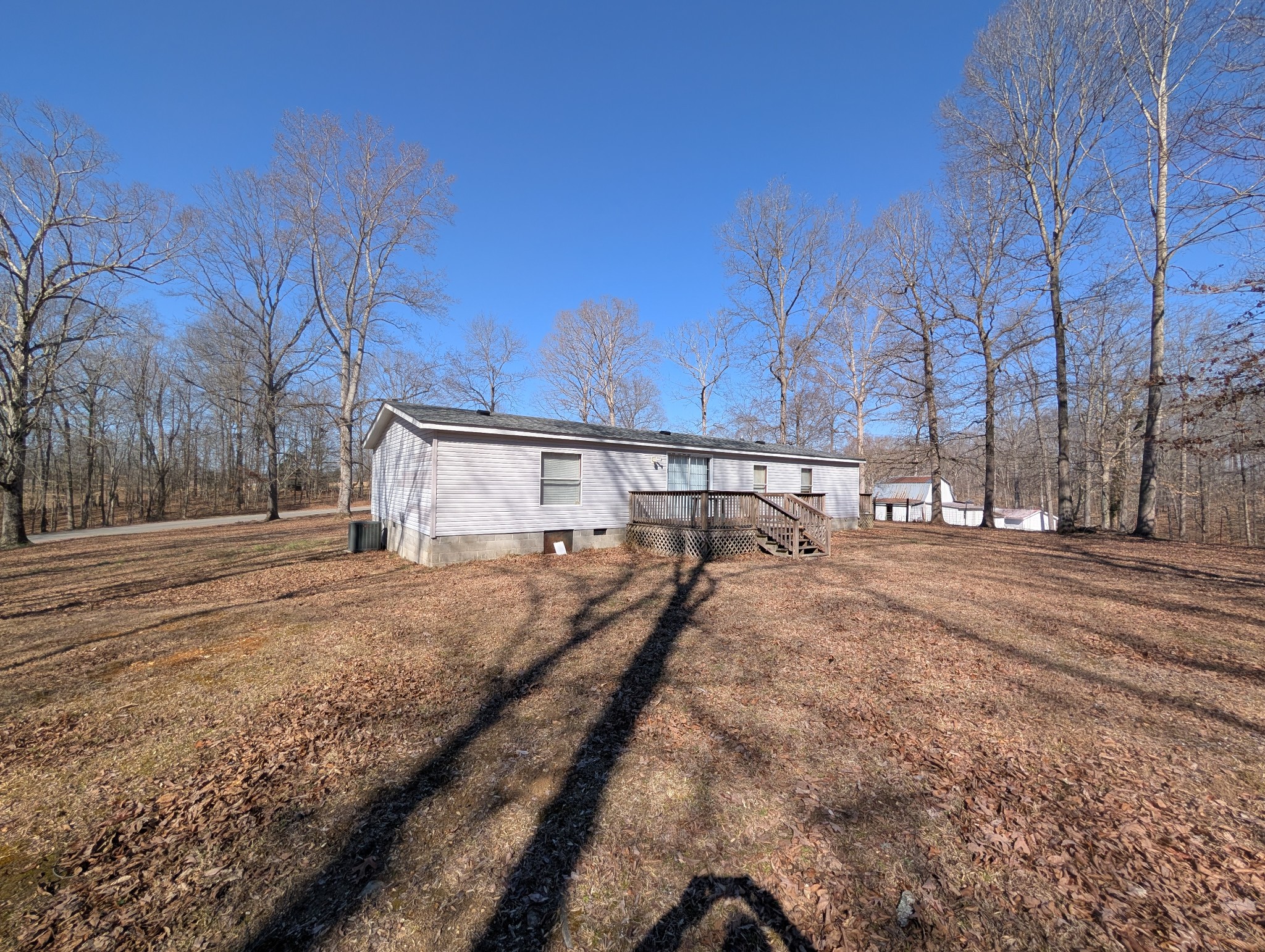 228 Shasteen Ridge Road Lynchburg, TN 37352 - Photo 4 of 12 a view of road with large trees