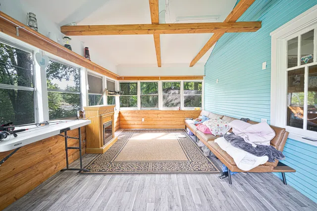 a outdoor space with patio the couch and wooden floor