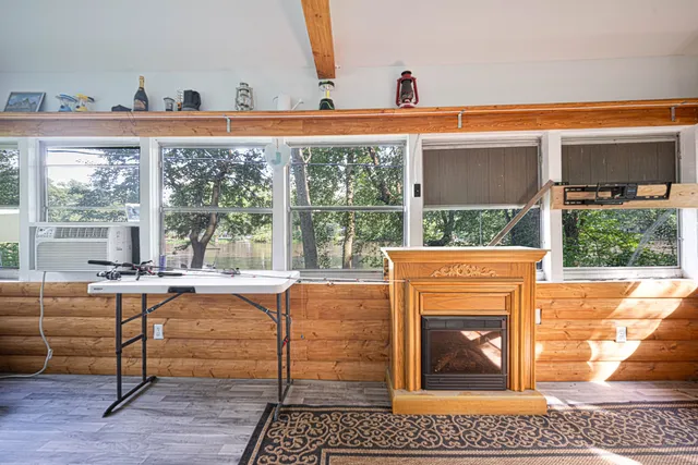 a room with furniture and a window