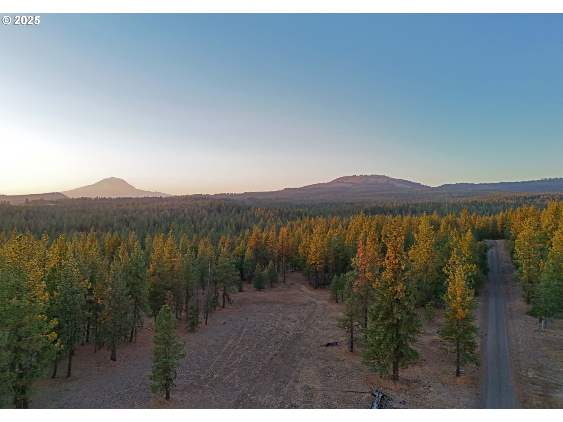 Boardman Way, Unit 5 Goldendale, WA 98620 - Photo 35 of 39 a view of a lake in middle of forest