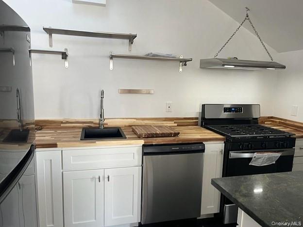 1418 Outlook Avenue, Unit 3 Bronx, NY 10465 - Photo 2 of 9 a kitchen with a stove and a sink