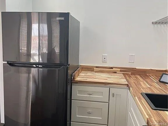a utility room with washer and dryer