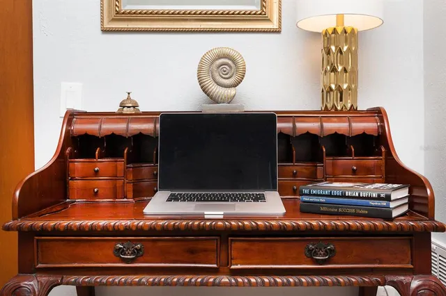 a view of a fireplace with wooden floor