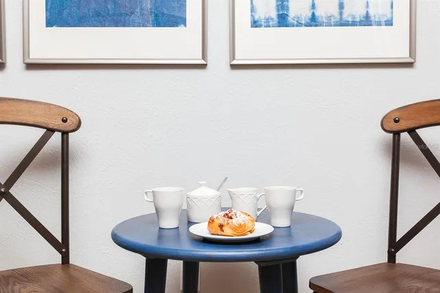 a workspace with furniture and wooden floor