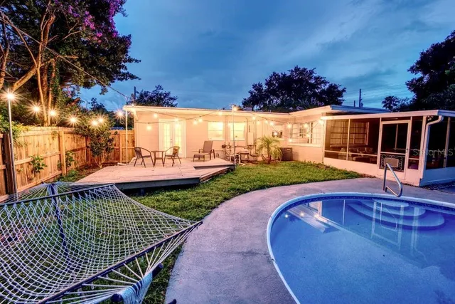 a view of outdoor sitting area with furniture
