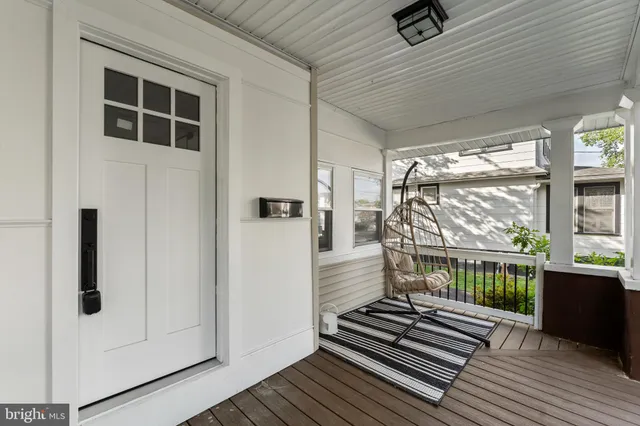 a view of a balcony with wooden floor