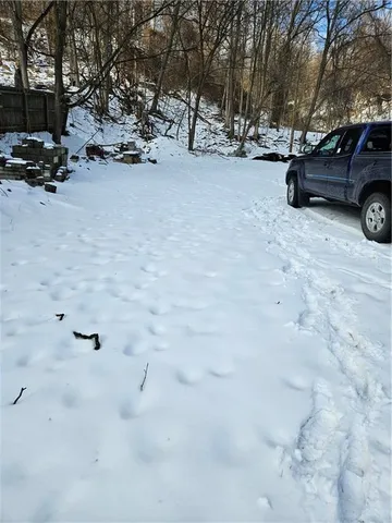 a view of parking with cars parked