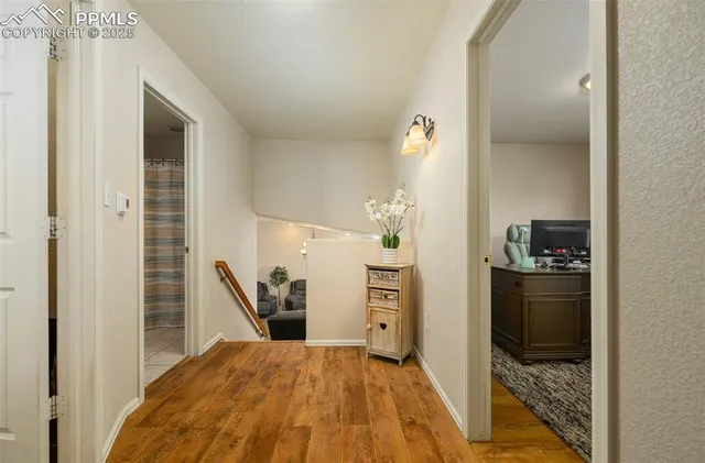 a bedroom with a bed and cabinets