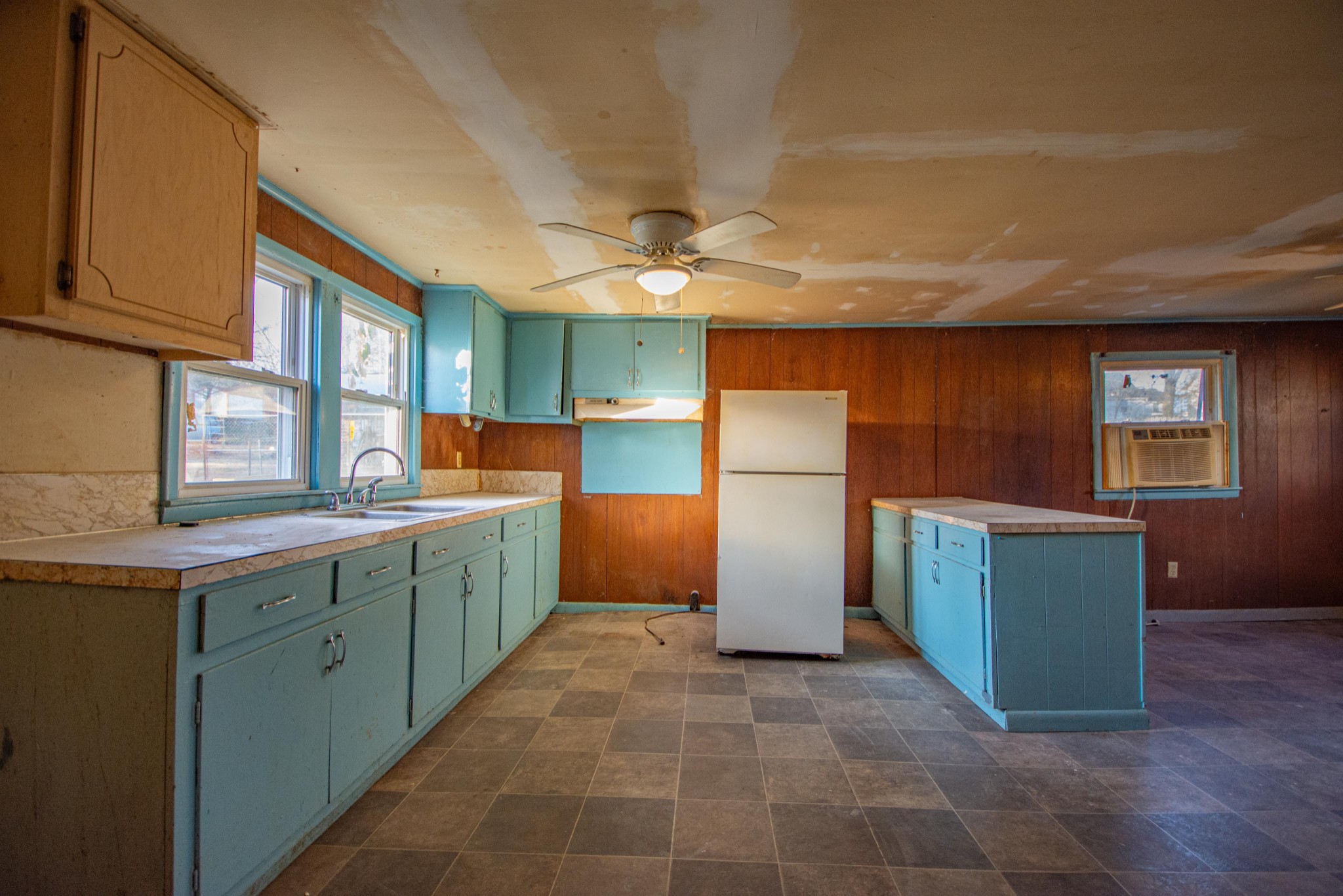 632 East Madison Street Pulaski, TN 38478 - Photo 15 of 22 a kitchen with refrigerator and cabinets