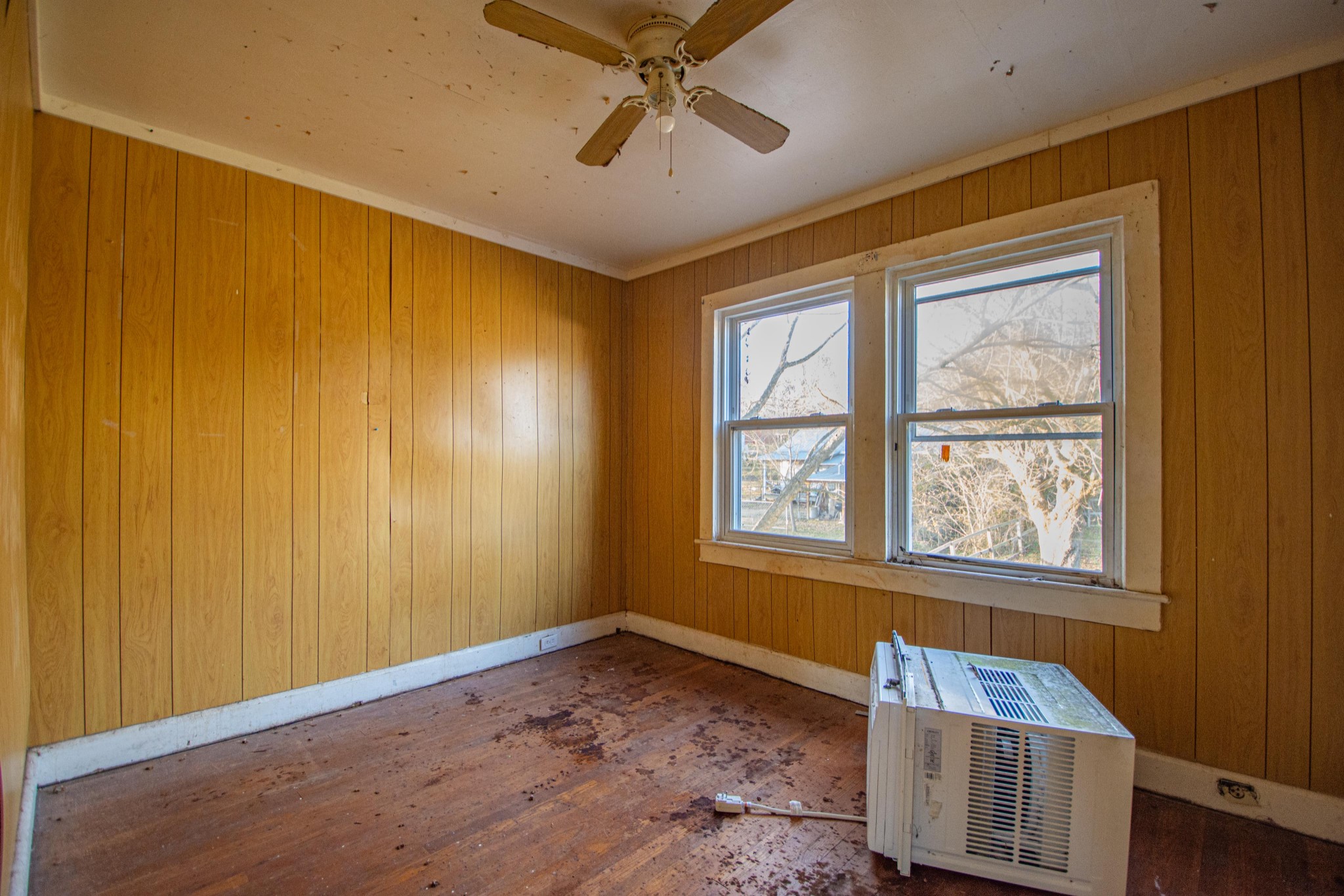 632 East Madison Street Pulaski, TN 38478 - Photo 21 of 22 a view of an empty room with a window and a chandelier