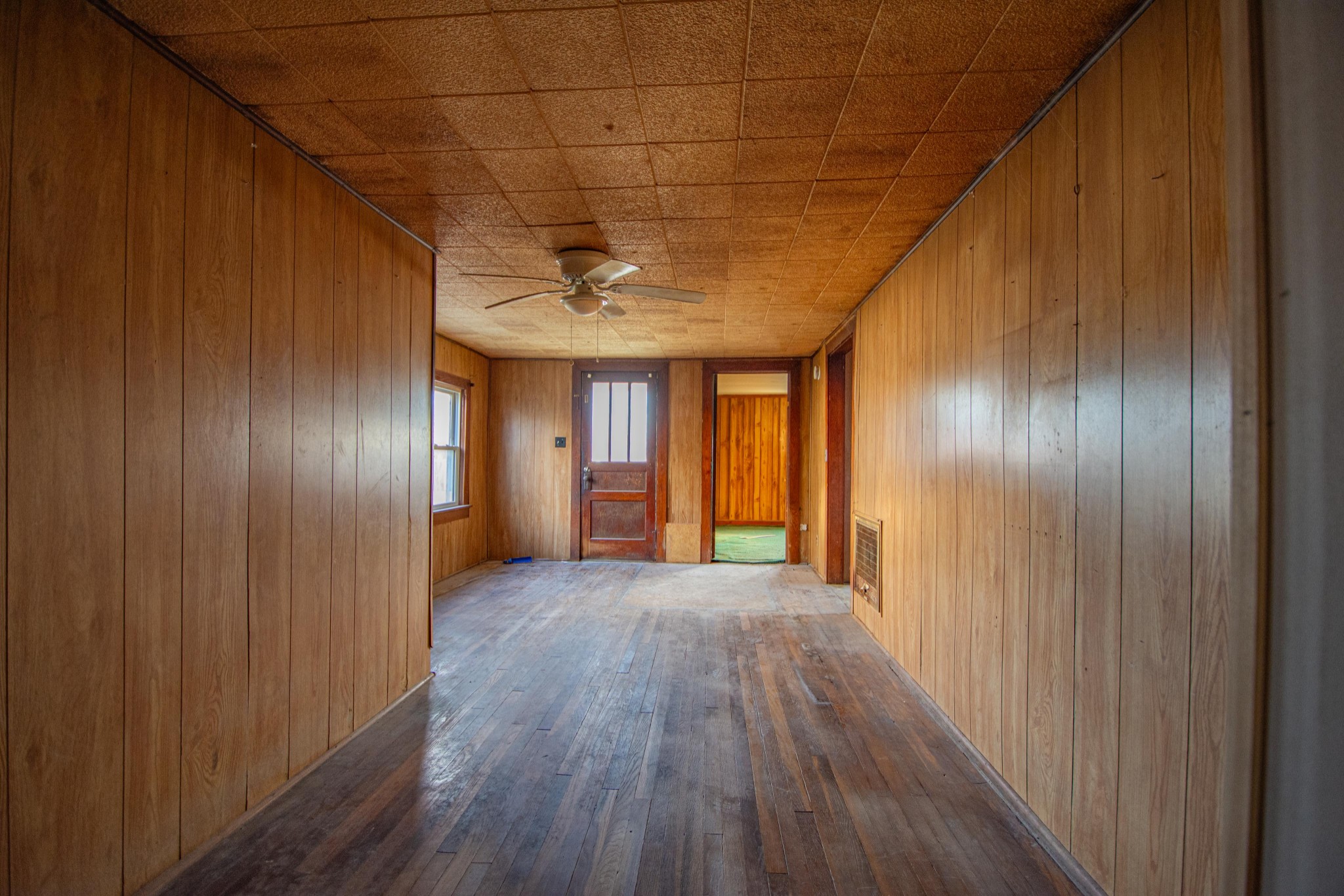 632 East Madison Street Pulaski, TN 38478 - Photo 7 of 22 a view of gallery with wooden floor