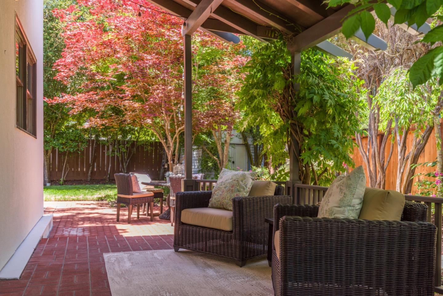 400 Warren Road San Mateo, CA 94402 - Photo 12 of 54 a outdoor living space with patio furniture and a potted plant