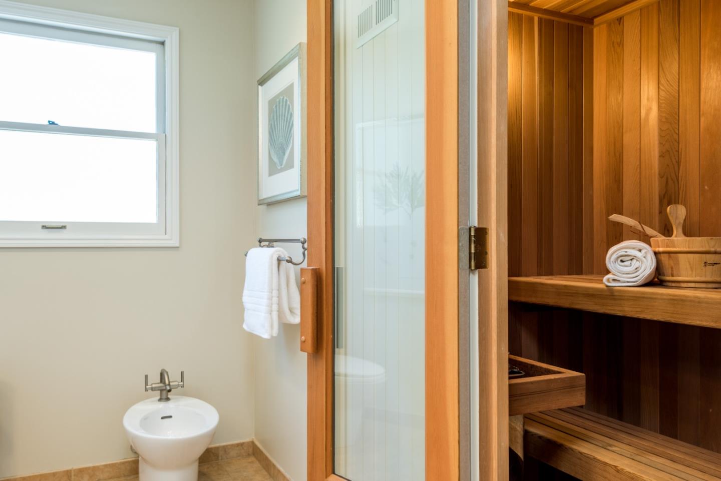 400 Warren Road San Mateo, CA 94402 - Photo 27 of 54 a bathroom with a sink and a mirror