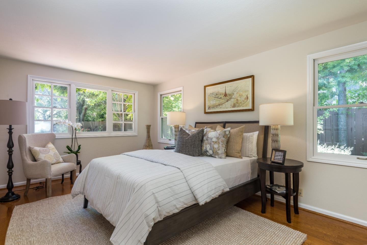 400 Warren Road San Mateo, CA 94402 - Photo 31 of 54 a bedroom with a large bed and a window