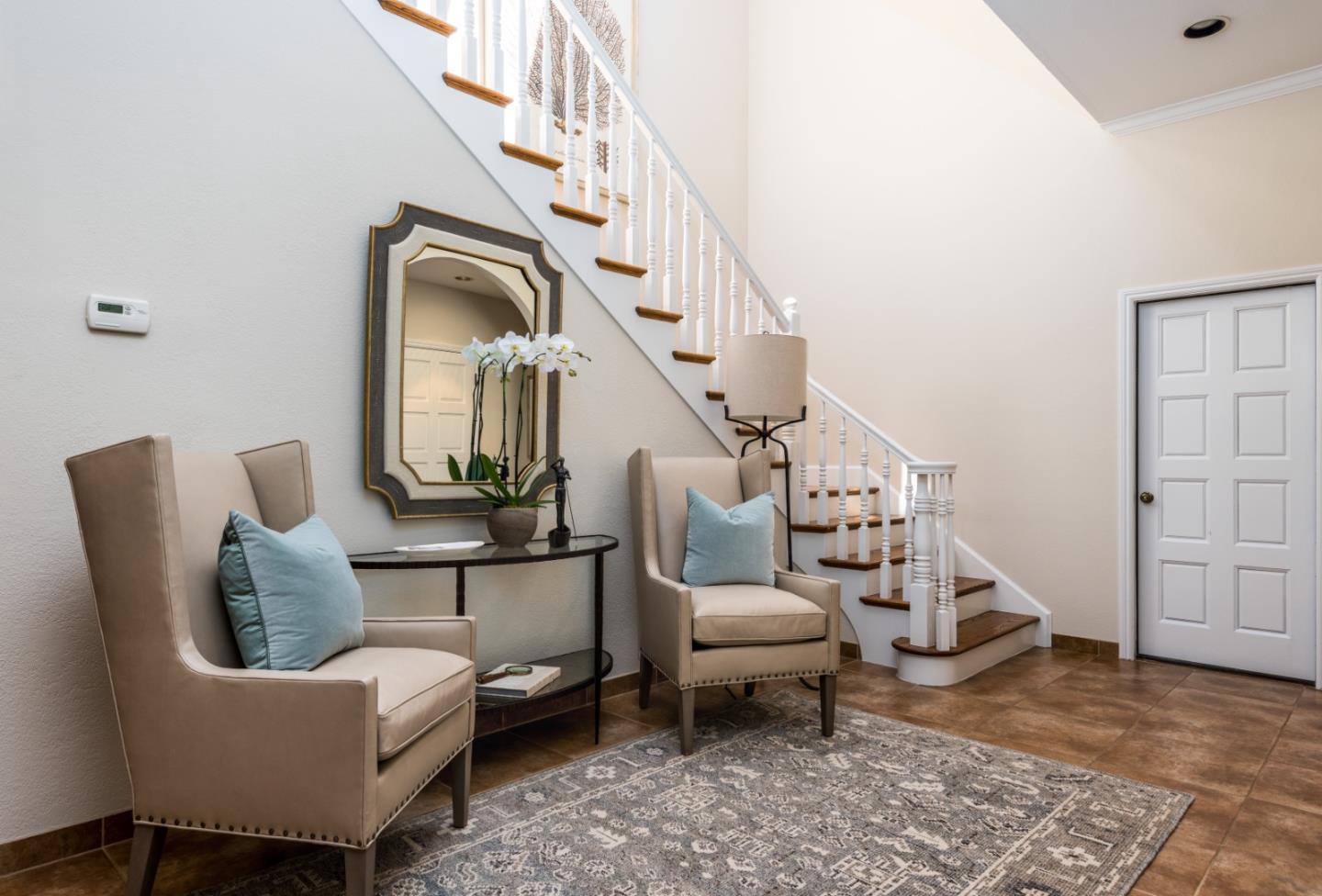 400 Warren Road San Mateo, CA 94402 - Photo 45 of 54 a living room with furniture and a rug