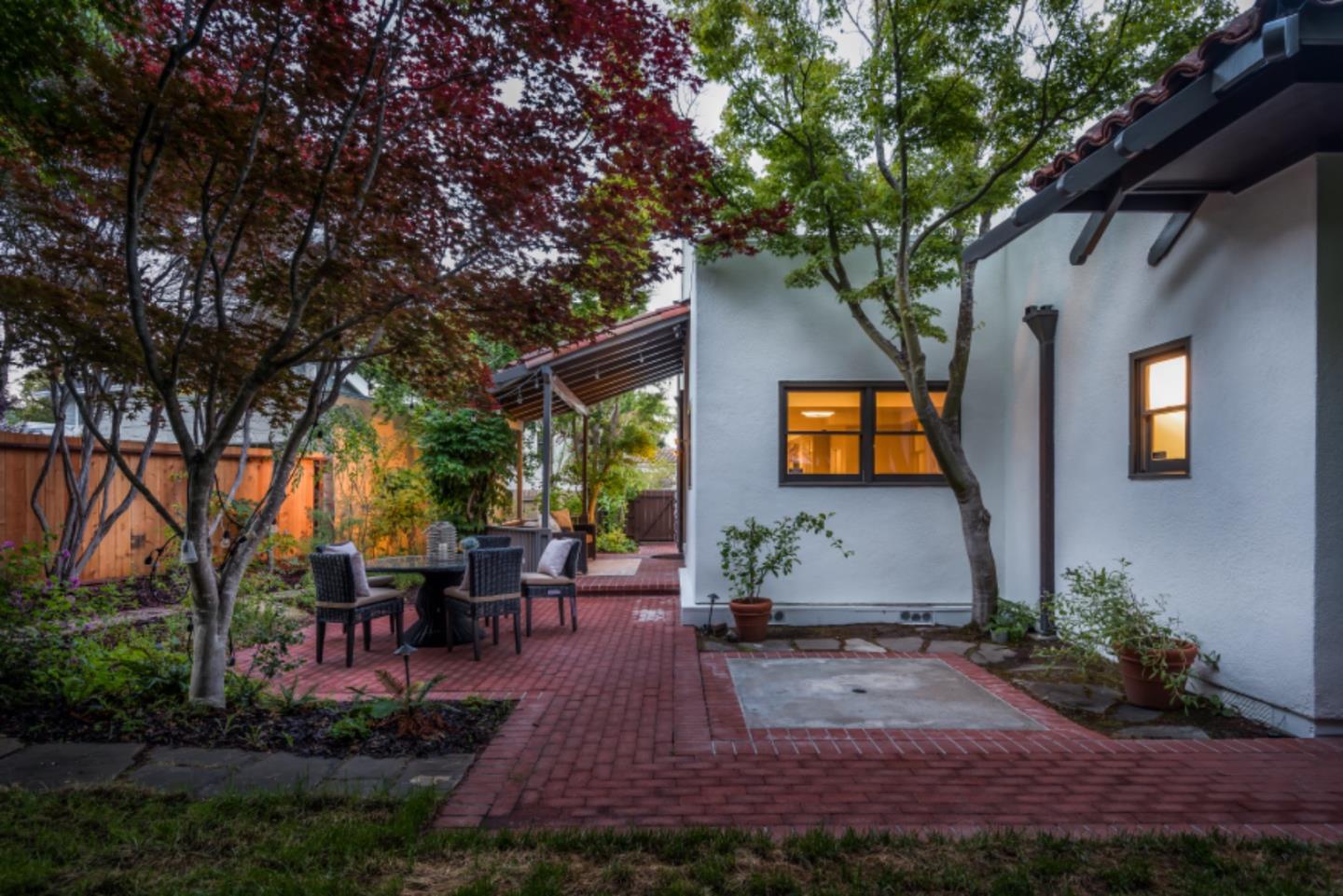 400 Warren Road San Mateo, CA 94402 - Photo 48 of 54 a front view of a house with garden