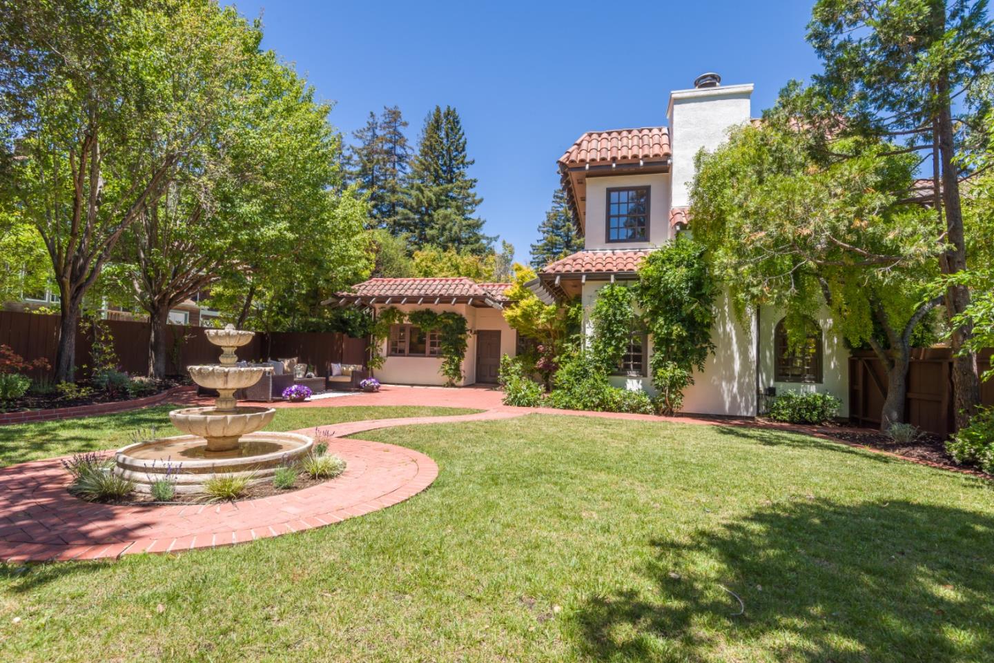 400 Warren Road San Mateo, CA 94402 - Photo 6 of 54 a view of a house with swimming pool and sitting area