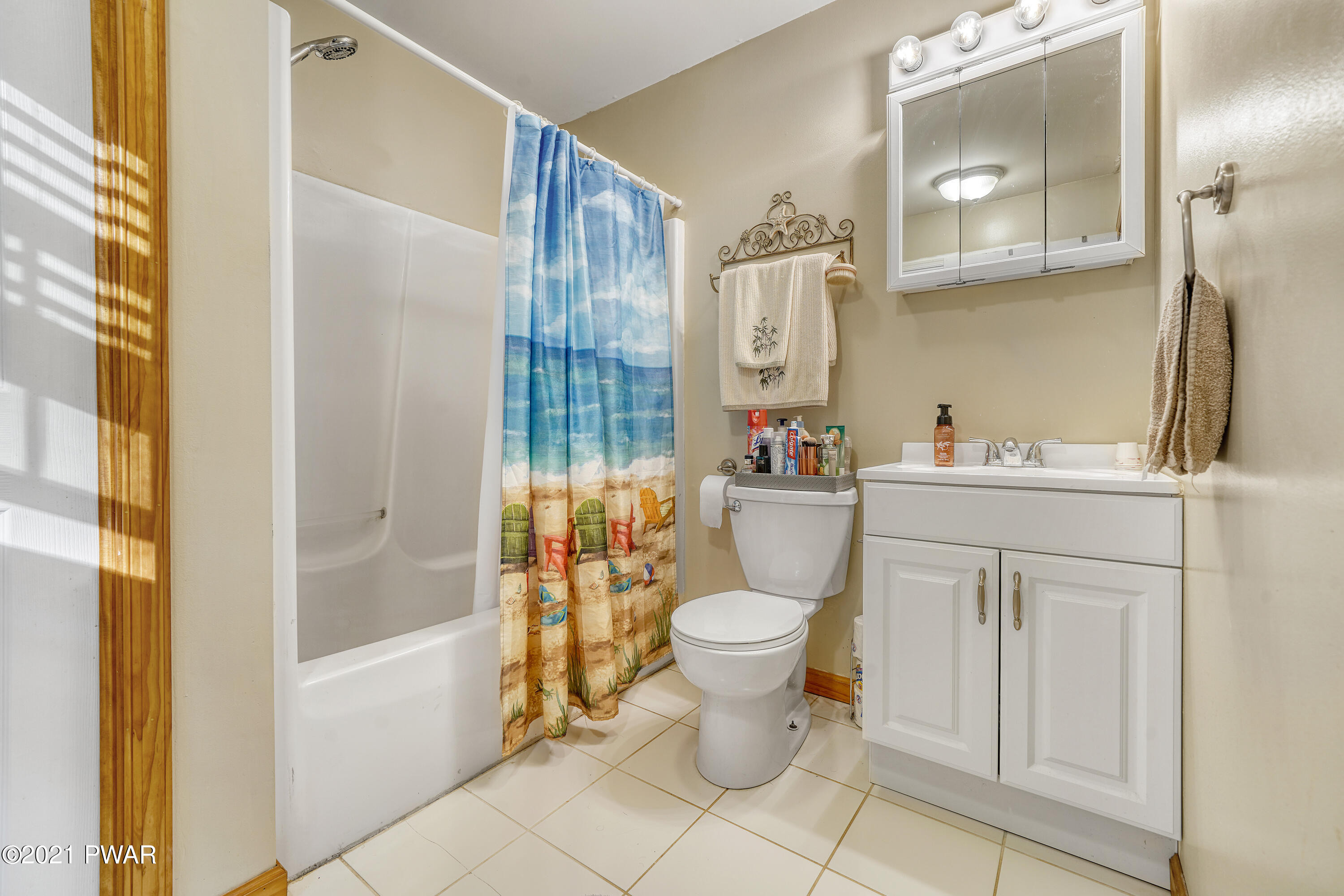 125 Forest Road Dingmans Ferry, PA 18328 - Photo 21 of 28 a bathroom with a sink toilet and shower